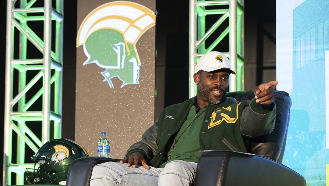 Michael Vick sits and answers questions from media and attendees durning a press conference on Monday, Dec. 23, 2024 in Norfolk, Va.