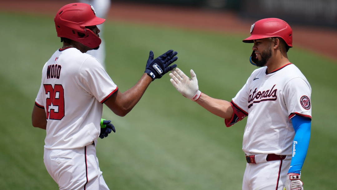 Washington Nationals' James Wood (29) celebrates with Luis Garcia Jr., after hitting a two-run home run against the Colorado Rockies during the fourth inning of a baseball game at Nationals Park, Thursday, June 19, 2025, in Washington.