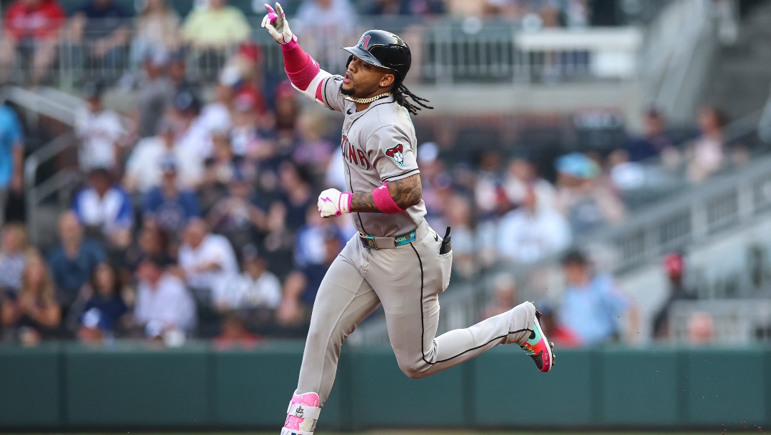 Arizona Diamondbacks' Ketel Marte reacts after hitting a solo home run in the first inning of a baseball game against the Atlanta Braves, Tuesday, June 3, 2025, in Atlanta.