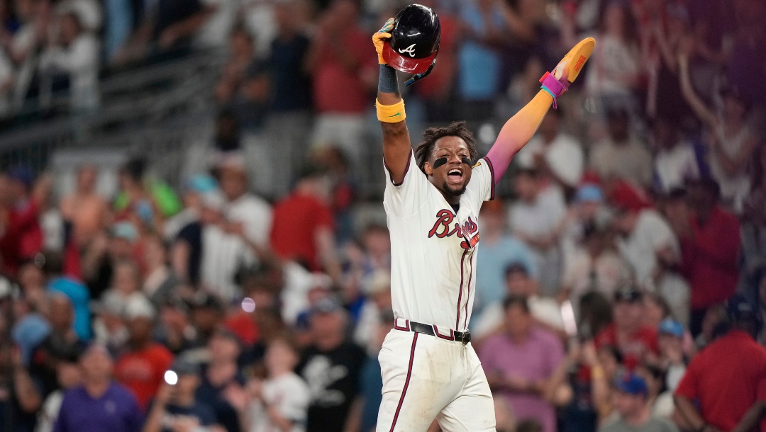 Atlanta Braves' Ronald Acuña Jr. (13) celebrates a win after the 10th inning of a baseball game against the New York Mets Tuesday, June 17, 2025, in Atlanta.
