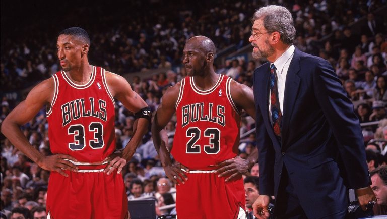 UNITED STATES - MAY 12: Basketball: NBA Playoffs, Chicago Bulls Michael Jordan (23), Scottie Pippen (33), and coach Phil Jackson on sidelines during Game 4 vs New York Knicks, New York, NY 5/12/1996
