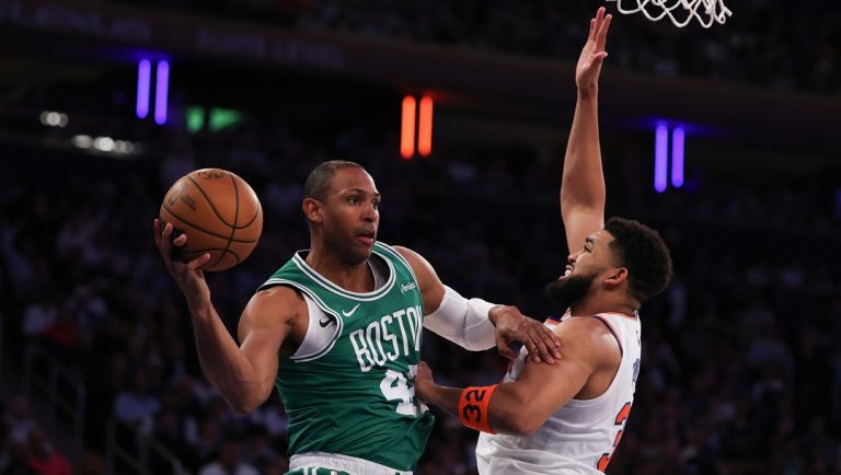 NEW YORK, NEW YORK - MAY 16: Al Horford #42 of the Boston Celtics looks to pass against Karl-Anthony Towns #32 of the New York Knicks during the third quarter in Game Six of the Eastern Conference Second Round NBA Playoffs at Madison Square Garden on May 16, 2025 in New York City.
