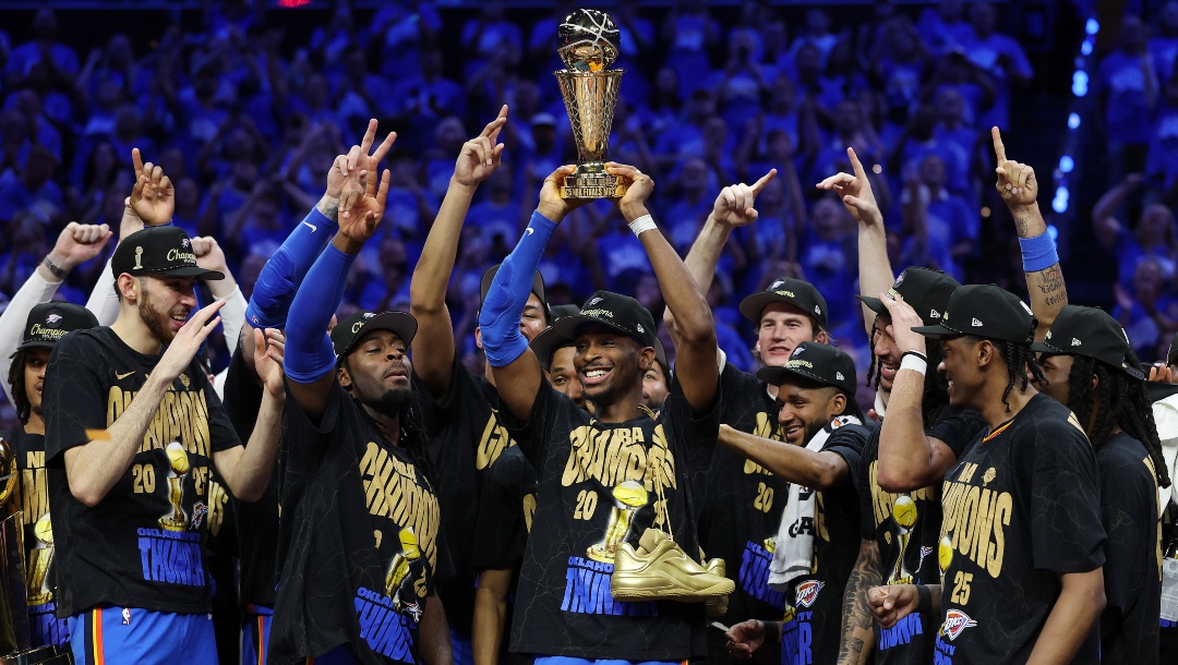 Shai Gilgeous-Alexander #2 of the Oklahoma City Thunder celebrates with the Bill Russell NBA Finals Most Valuable Player trophy after defeating the Indiana Pacers 103-91 in Game Seven of the 2025 NBA Finals at Paycom Center on June 22, 2025 in Oklahoma City, Oklahoma.