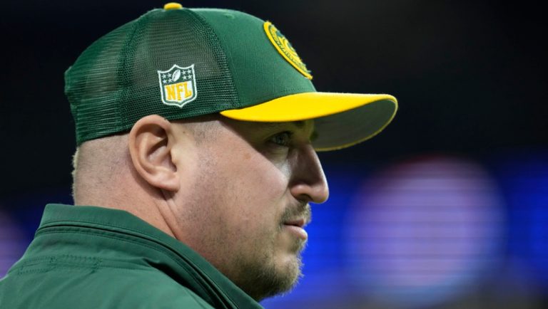 Green Bay Packers offensive coordinator Adam Stenavich stands on the field before an NFL football game against the Minnesota Vikings, Sunday, Dec. 31, 2023, in Minneapolis.
