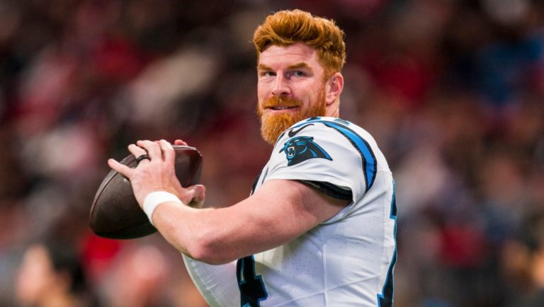 FILE - Carolina Panthers quarterback Andy Dalton (14) warms up during the first half of an NFL football game against the Atlanta Falcons, Sunday, Jan. 5, 2025, in Atlanta.