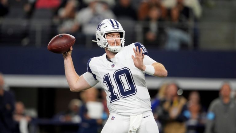 Dallas Cowboys quarterback Cooper Rush throws a pass during an NFL football game against the Cincinnati Bengals in Arlington, Texas, Monday, Dec. 9, 2024.
