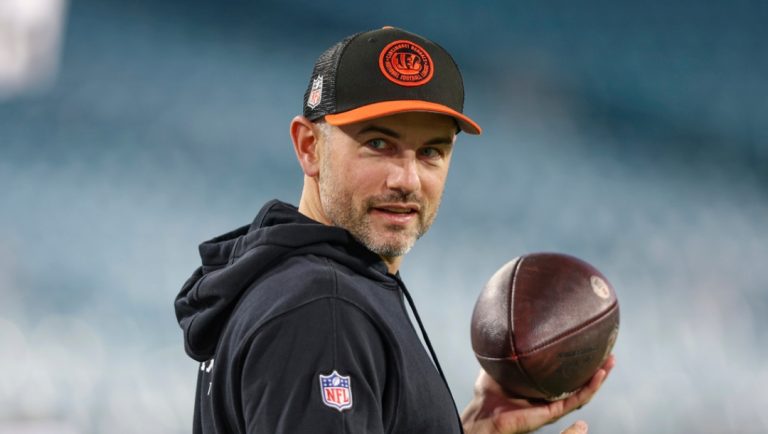 Cincinnati Bengals quarterbacks coach Dan Pitcher warms up before an NFL football game against the Jacksonville Jaguars, Monday, Dec. 4, 2023, in Jacksonville, Fla.