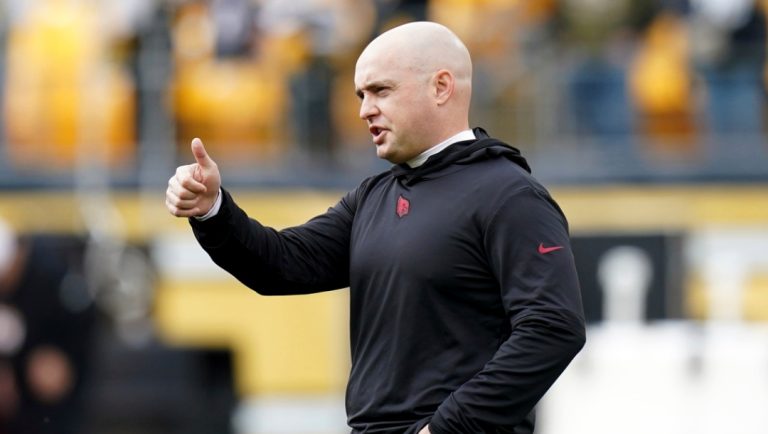 Arizona Cardinals offensive coordinator Drew Petzing watches warmups before an NFL football game against the Pittsburgh Steelers, Sunday, Dec. 3, 2023, in Pittsburgh.