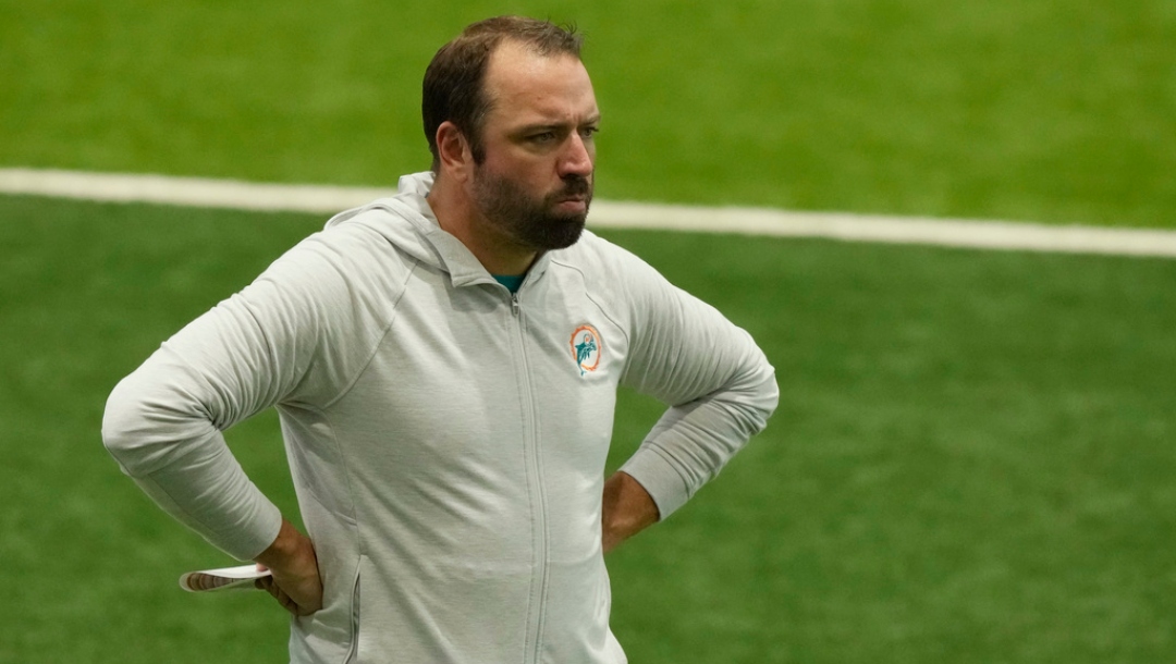 Miami Dolphins offensive coordinator Frank Smith watches during practice at the NFL football team's training facility, Friday, July 28, 2023, in Miami Gardens, Fla.