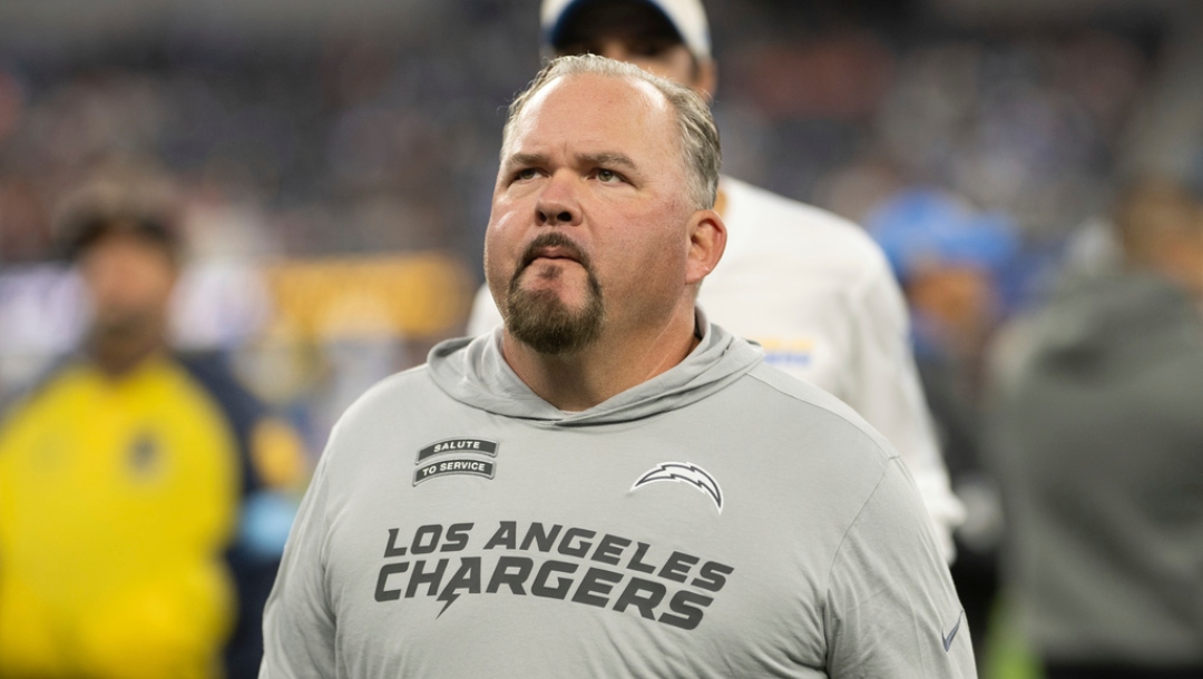 Los Angeles Chargers offensive coordinator Greg Roman walks back to the locker room before an NFL football game against the Cincinnati Bengals, Sunday, Nov. 17, 2024, in Inglewood, Calif.