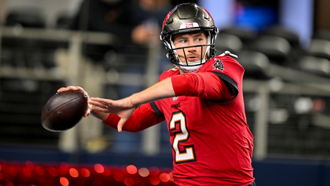 Tampa Bay Buccaneers quarterback Kyle Trask warms up before an NFL football game against the Dallas Cowboys in Arlington, Texas, Sunday, Dec. 22, 2024.