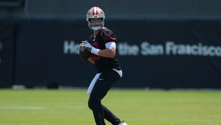 San Francisco 49ers quarterback Mac Jones runs a drill during NFL football practice Wednesday, June 4, 2025, in Santa Clara, Calif.