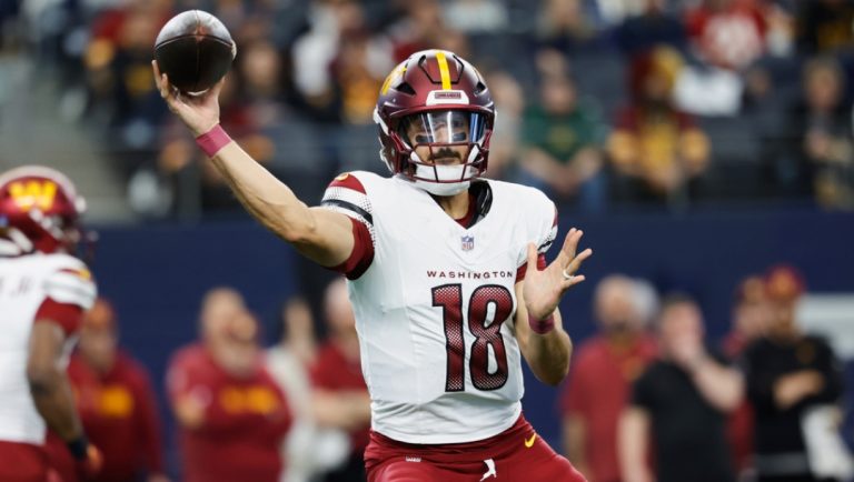 FILE - Washington Commanders quarterback Marcus Mariota (18) looks to pass during a NFL football game against the Dallas Cowboys on Sunday, Jan. 5, 2025, in Arlington, Texas.