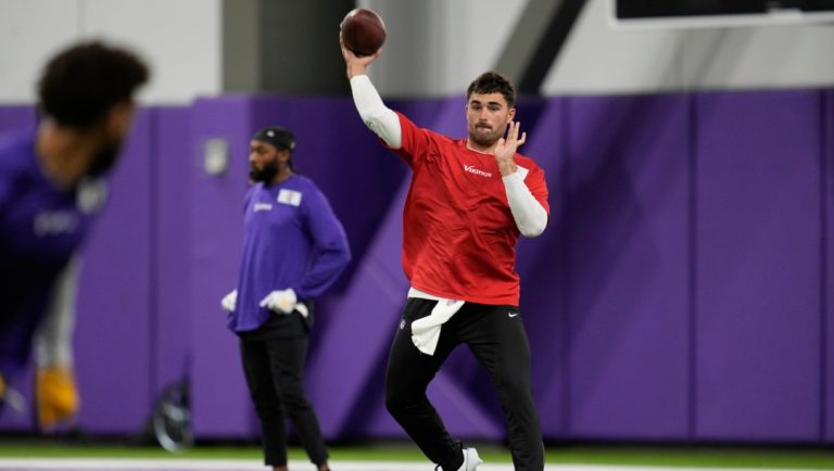 Minnesota Vikings quarterback Sam Howell takes part in drills during an NFL football team practice in Eagan, Minn., Tuesday, April 29, 2025.