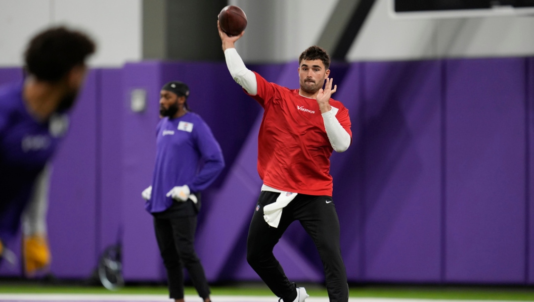 Minnesota Vikings quarterback Sam Howell takes part in drills during an NFL football team practice in Eagan, Minn., Tuesday, April 29, 2025.