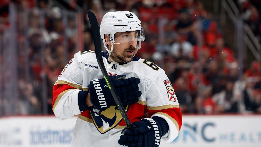 Florida Panthers' Brad Marchand (63) waits for a face-off against the Carolina Hurricanes during the first period of Game 2 of the NHL hockey Stanley Cup Eastern Conference finals in Raleigh, N.C., Thursday, May 22, 2025.