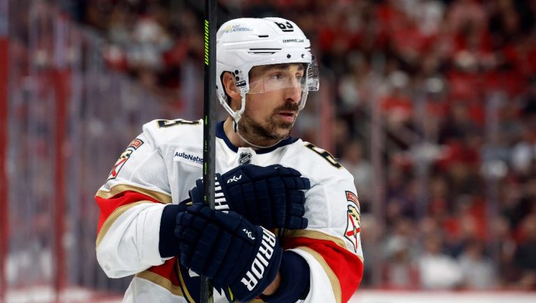 Florida Panthers' Brad Marchand (63) waits for a face-off against the Carolina Hurricanes during the first period of Game 2 of the NHL hockey Stanley Cup Eastern Conference finals in Raleigh, N.C., Thursday, May 22, 2025.