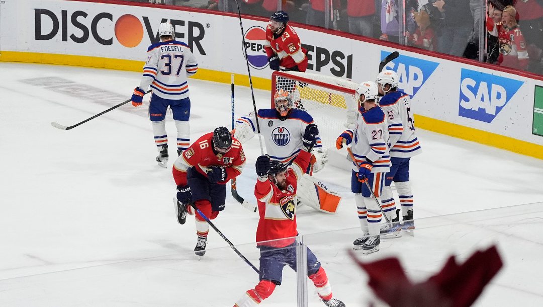 Florida Panthers players celebrate a goal by Sam Reinhart, not shown, during the second period of Game 7 of the NHL hockey Stanley Cup Final against the Edmonton Oilers, Monday, June 24, 2024, in Sunrise, Fla.