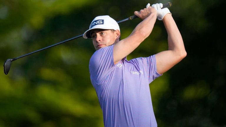 Taylor Moore watches his tee shot on the 10th hole during the first round of the 3M Open golf tournament at the Tournament Players Club, Thursday, July 25, 2024, in Blaine, Minn.