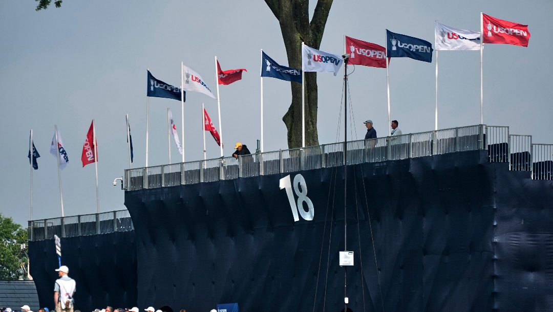 Fans walk up the ninth fairway toward the clubhouse during a practice round for the 2025 US Open golf championship at Oakmont Country Club in Oakmont, Pa., Monday, June 9, 2025.