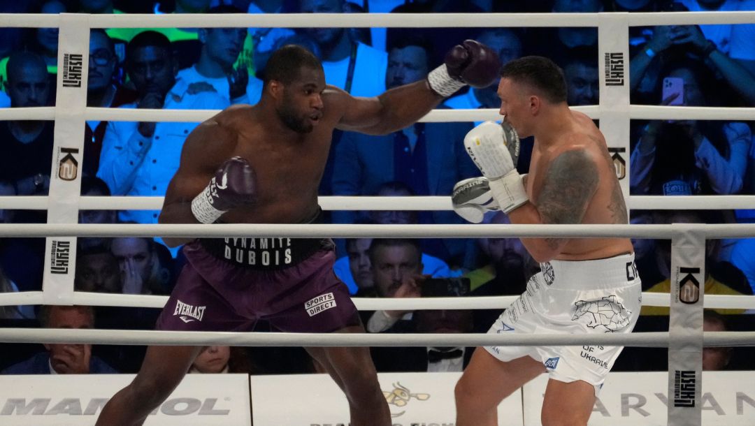 Britain's Daniel Dubois, left, and Ukraine's Oleksandr Usyk during their world heavyweight title fight at Tarczynski Arena.