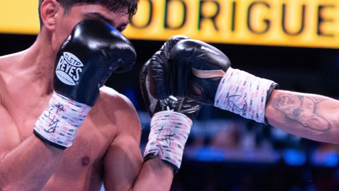 Jesse "Bam" Rodriguez, right, in action against Padro Guevara, left, during the WBC World and Ring Magazine Super-Flyweight.