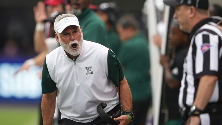Eastern Michigan head coach Chris Creighton yells at an official during the first half of an NCAA college football game against Washington, Saturday, Sept. 7, 2024, in Seattle.