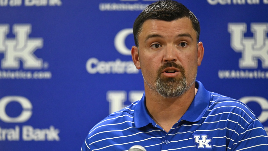 Kentucky defensive coordinator Brad White answers questions during the NCAA college football team's media day in Lexington, Ky., Wednesday, Aug. 3, 2022.