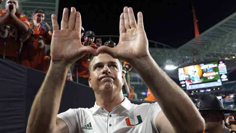 Miami head coach Mario Cristobal walks off the field after an NCAA college football game against Florida State, Saturday, Oct. 26, 2024, in Miami Gardens, Fla.