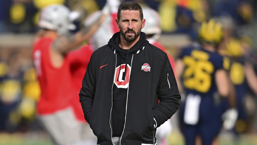 Ohio State offensive coordinator Brian Hartline stands before a NCAA college football game against Michigan, Saturday, Nov. 25, 2023, in Ann Arbor, Michigan.