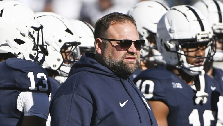 Penn State offensive coordinator Andy Kotelnicki watches warmup before an NCAA college football game between Penn State and Ohio State, Saturday, Nov. 2, 2024, in State College, Pa.