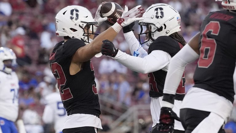 Stanford safety Mitch Leigber, left, is congratulated by cornerback Cam Richardson after intercepting a pass against SMU during the first half of an NCAA college football game in Stanford, Calif., Saturday, Oct. 19, 2024.