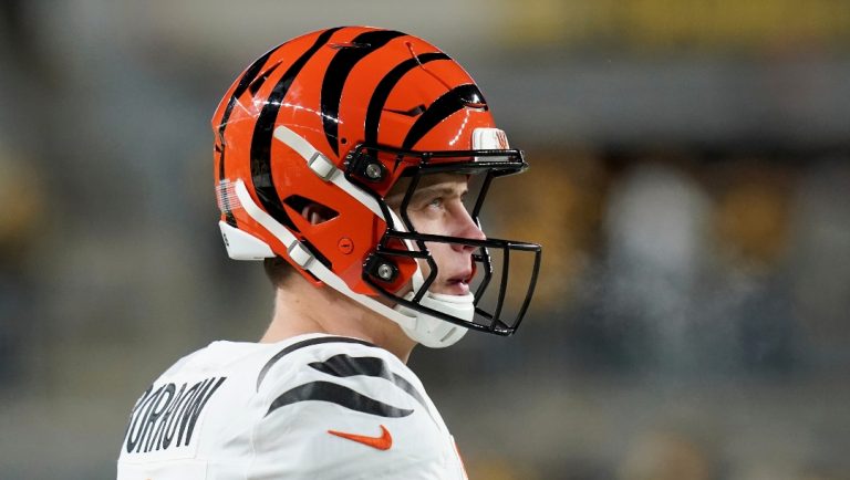 Cincinnati Bengals quarterback Joe Burrow (9) warms up before an NFL football game against the Pittsburgh Steelers Saturday, Jan. 4, 2025, in Pittsburgh. (AP Photo/Matt Freed)
