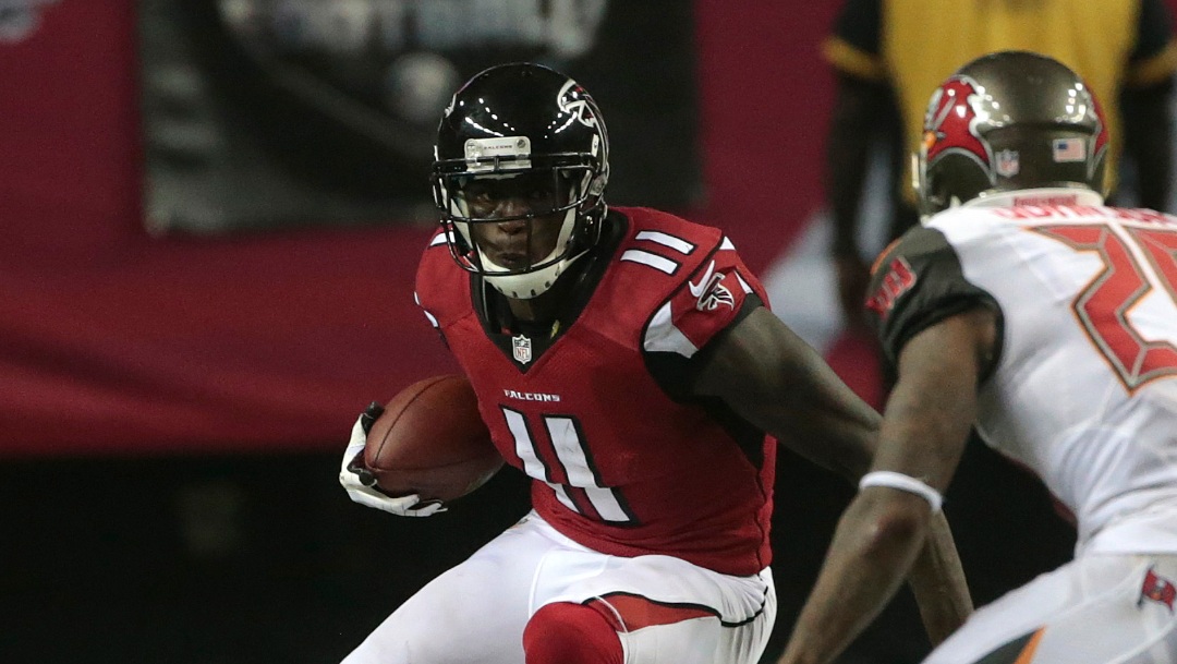 Atlanta Falcons wide receiver Julio Jones (11) moves against Tampa Bay Buccaneers cornerback Leonard Johnson (29) during the first half of an NFL football game, Thursday, Sept. 18, 2014, in Atlanta.
