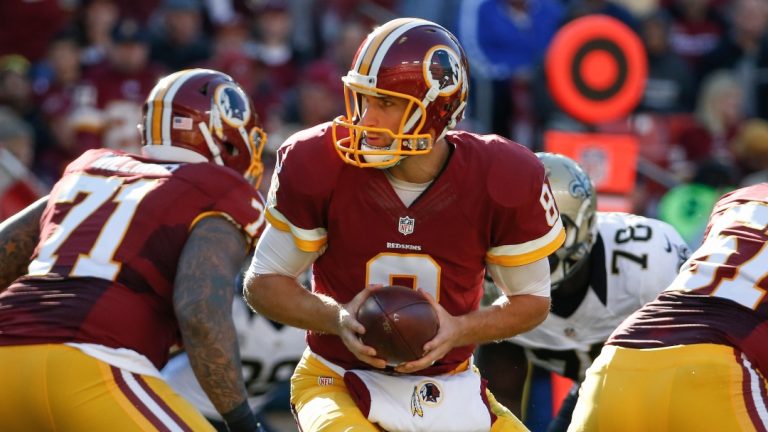 Washington Redskins quarterback Kirk Cousins (8) turns out of the pocket during the first half of an NFL football game against the New Orleans Saints in Landover, Md., Sunday, Nov. 15, 2015. (AP Photo/Alex Brandon)