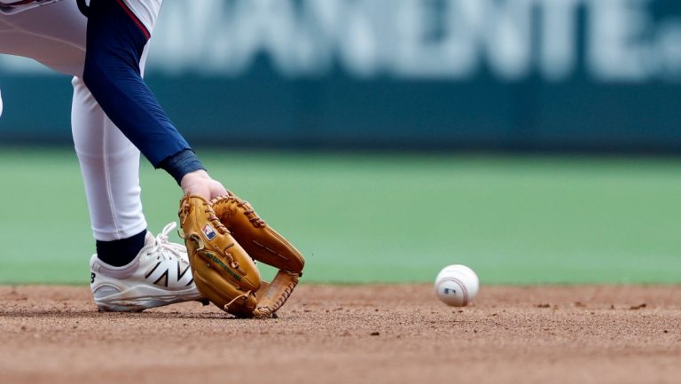 Atlanta Braves shortstop Nick Allen fields a ground ball from Philadelphia Phillies' J.T. Realmuto during the fourth inning of a baseball game, Sunday, June 29, 2025, in Atlanta.