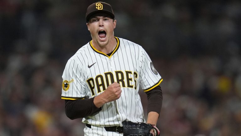 San Diego Padres relief pitcher Mason Miller celebrates after striking out Boston Red Sox's Wilyer Abreu for the third out during the eighth inning of a baseball game Saturday, Aug. 9, 2025, in San Diego.