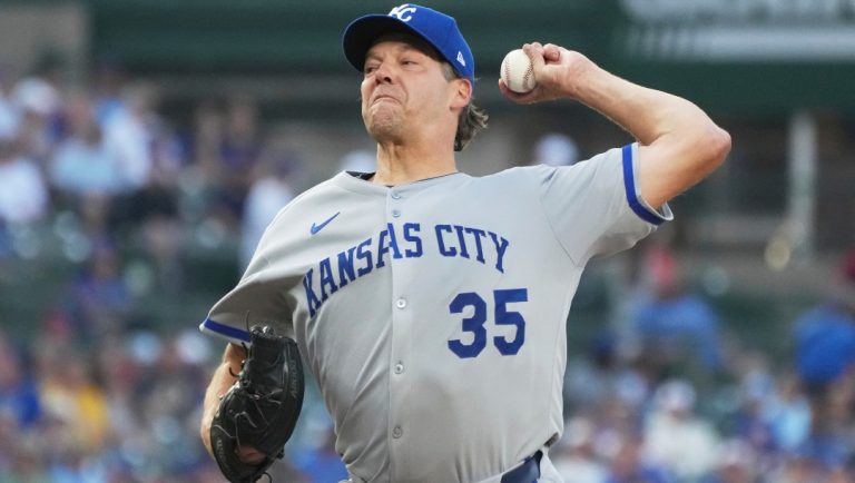 Kansas City Royals starting pitcher Rich Hill throws against the Chicago Cubs during the first inning of a baseball game in Chicago, Tuesday, July 22, 2025.