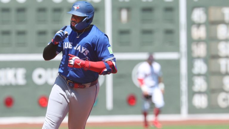 Toronto Blue Jays Vladimir Guerrero Jr. gestures after hitting a home run during the first inning of a baseball game against the Boston Red Sox, Sunday, June 29, 2025, in Boston.