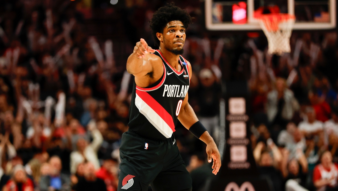 Scoot Henderson #00 of the Portland Trail Blazers gestures during the fourth quarter of the game against the Cleveland Cavaliers at the Moda Center on March 25, 2025 in Portland, Oregon.