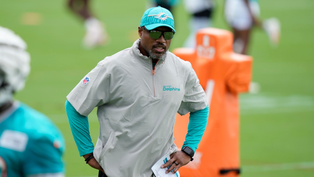 FILE - Miami Dolphins defensive coordinator Anthony Weaver watches players during NFL football training camp, July 24, 2024, in Miami Gardens, Fla.