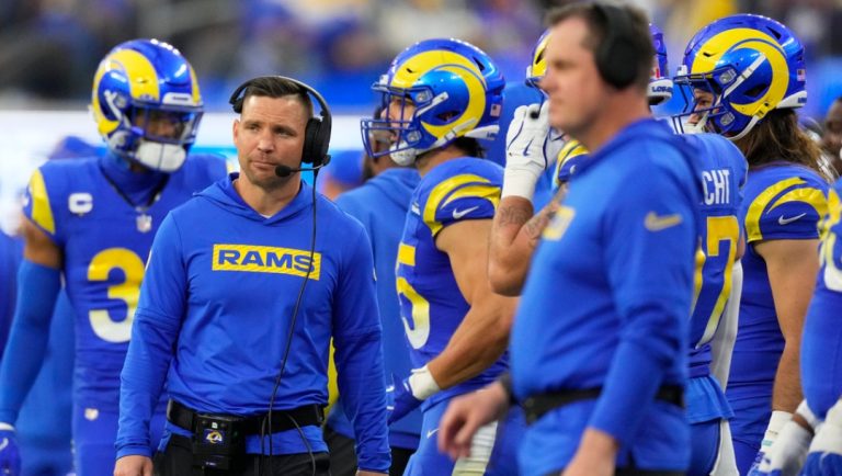 Los Angeles Rams defensive coordinator Chris Shula walk along the sideline during the second half of an NFL football game against the Seattle Seahawks, Sunday, Jan. 5, 2025, in Inglewood, Calif.