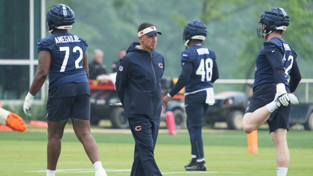 Chicago Bears' defensive coordinator Dennis Allen watches players during NFL football practice at Halas Hall in Lake Forest, Ill., Wednesday, June 4, 2025.
