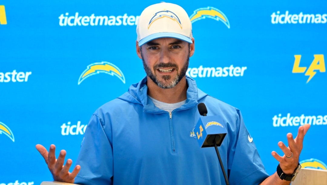 Los Angeles Chargers defensive coordinator Jesse Minter speaks at a news conference during NFL football training camp Friday, July 26, 2024, in El Segundo, Calif.