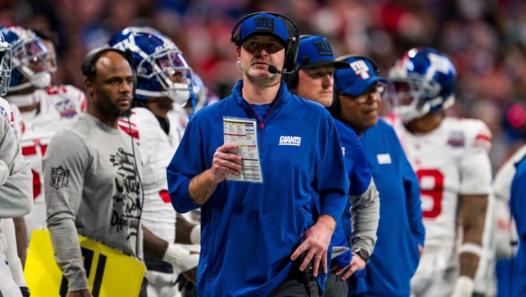 New York Giants defensive coordinator Shane Bowen works during the first half of an NFL football game against the Atlanta Falcons, Sunday, Dec. 22, 2024, in Atlanta. The Falcons defeated the Giants 34-7.