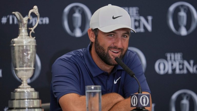 Scottie Scheffler of the United States speak at a press conference after winning the British Open golf championship at the Royal Portrush Golf Club, Northern Ireland, Sunday, July 20, 2025.