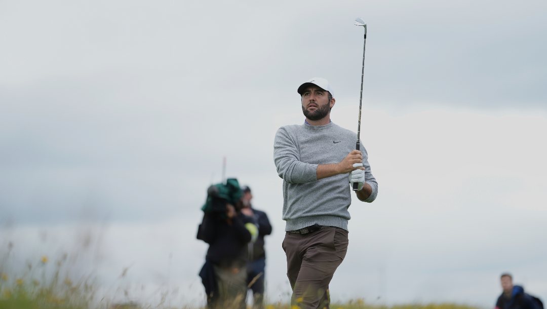 Scottie Scheffler of the United States plays from the rough on the 2nd hole during the first round of the British Open golf championship at the Royal Portrush Golf Club, Northern Ireland, Thursday, July 17, 2025.