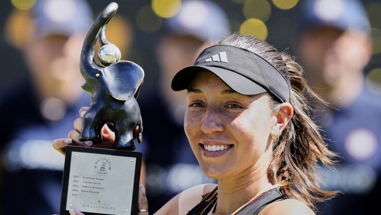 US Jessica Pegula poses with the trophy as she won against Poland's Iga Swiatek in the final match at the WTA tennis tournament in Bad Homburg, Germany, Saturday, June 28, 2025.