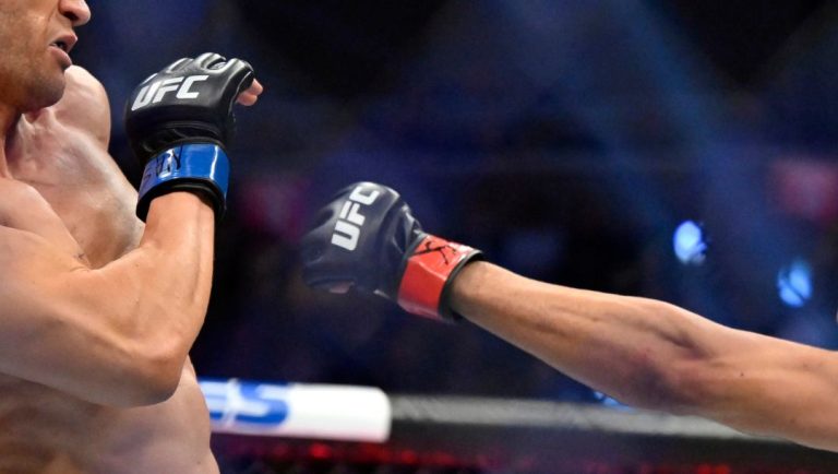 Actor Jake Gyllenhaal, left, is "punched" actor Jay Hieron while filming a scene for an upcoming remake of the 1989 movie.