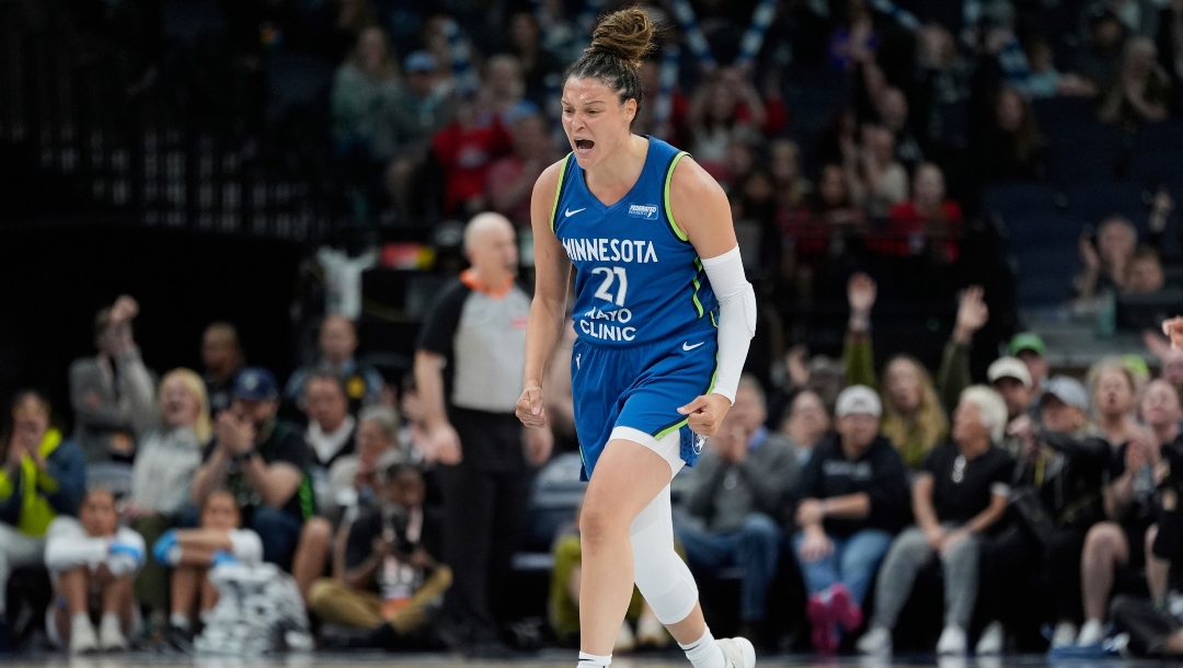Minnesota Lynx guard Kayla McBride (21) celebrates during the second half of a WNBA basketball game against the Seattle Storm, Tuesday, May 27, 2025, in Minneapolis.